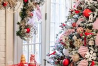 Red and White Flocked Christmas Tree with Snowy Branches