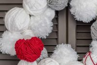 DIY Yarn Ball Valentine’s Day Wreath Tutorial
