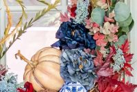 Console Table Styling for Fall: Faux Flowers and Wreath Tips