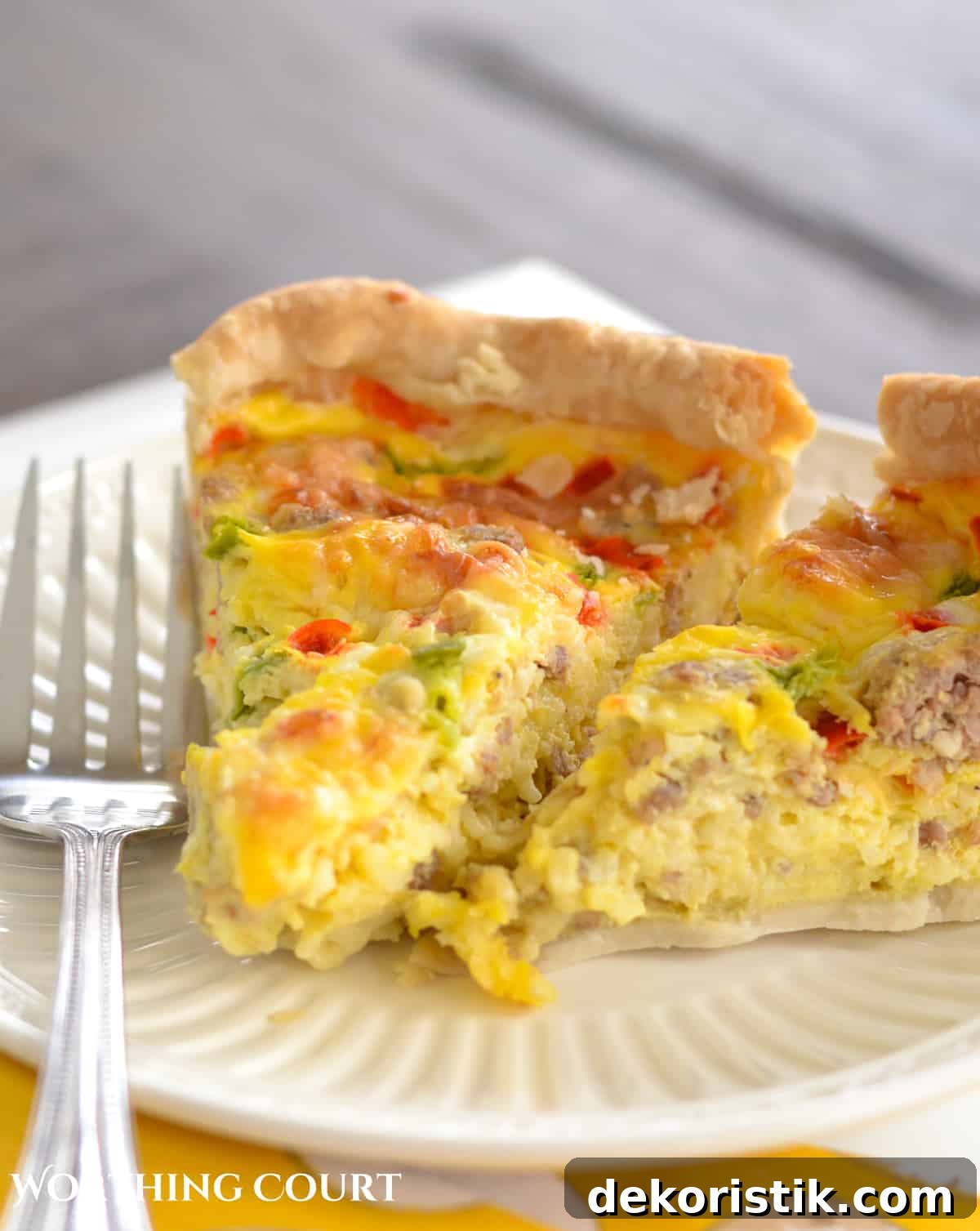 Sausage and egg breakfast casserole pieces on a plate