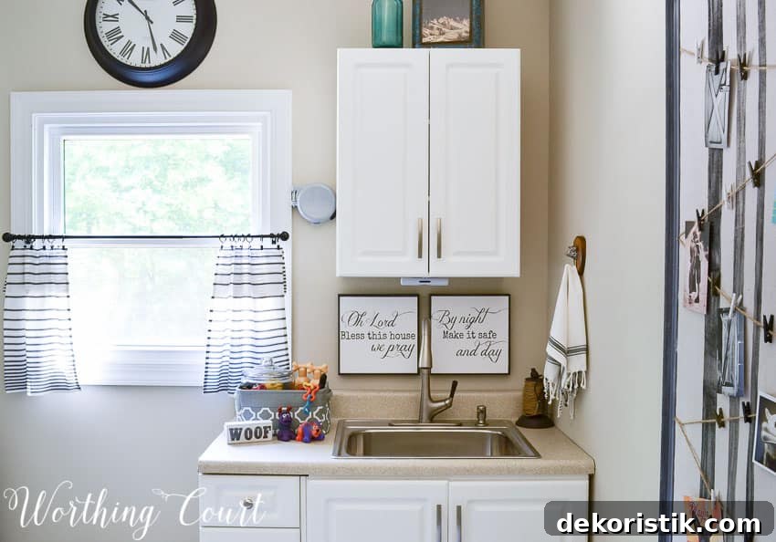 Transform a Cluttered Laundry Room into a Bright, Organized Space 9 A small Laundry room sink area.