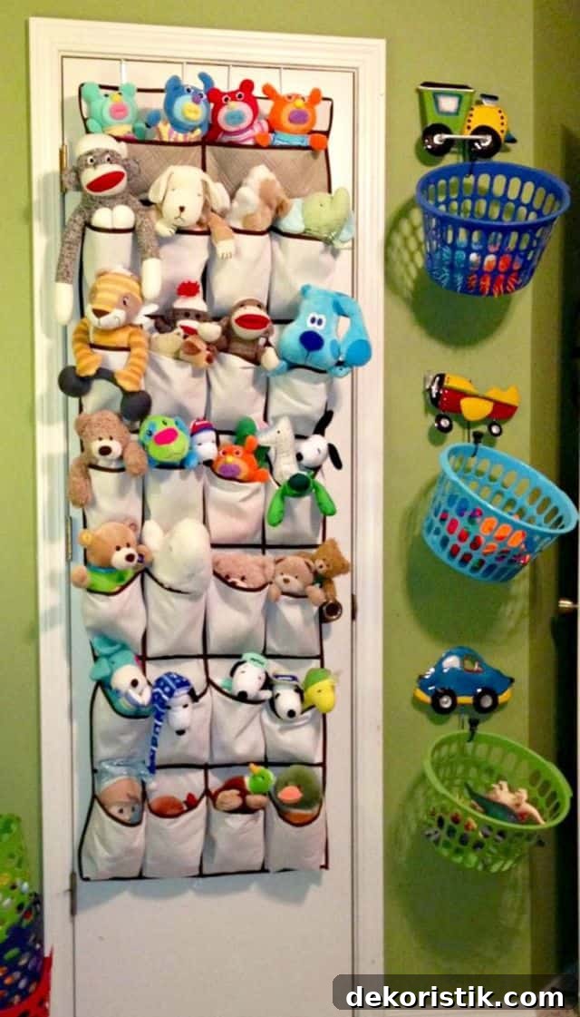 Stuffed animals stored in a shoe bag on the inside of a closet door