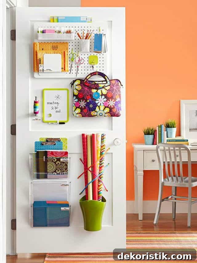 Miscellaneous office supplies stored on the inside of a closet door