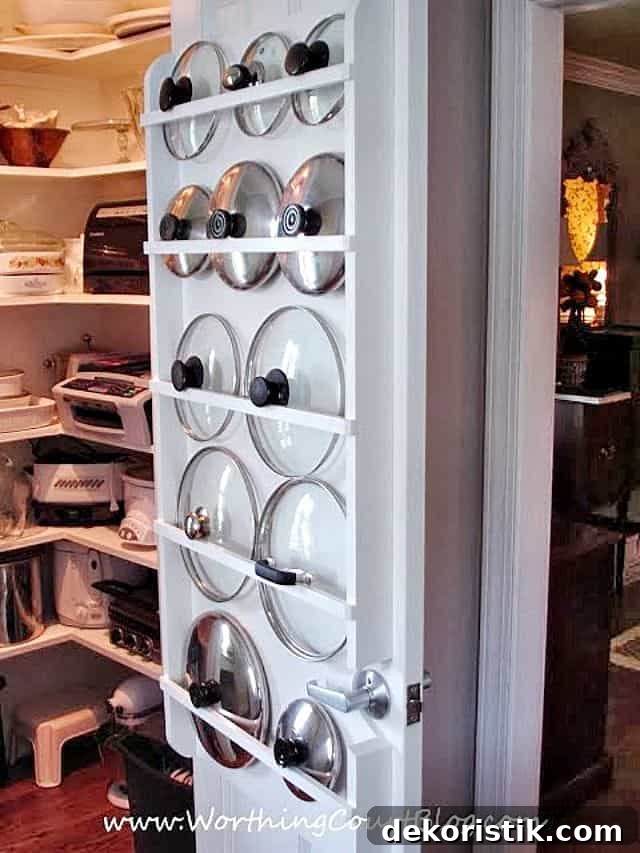 Use the back of a pantry door to store pot lids