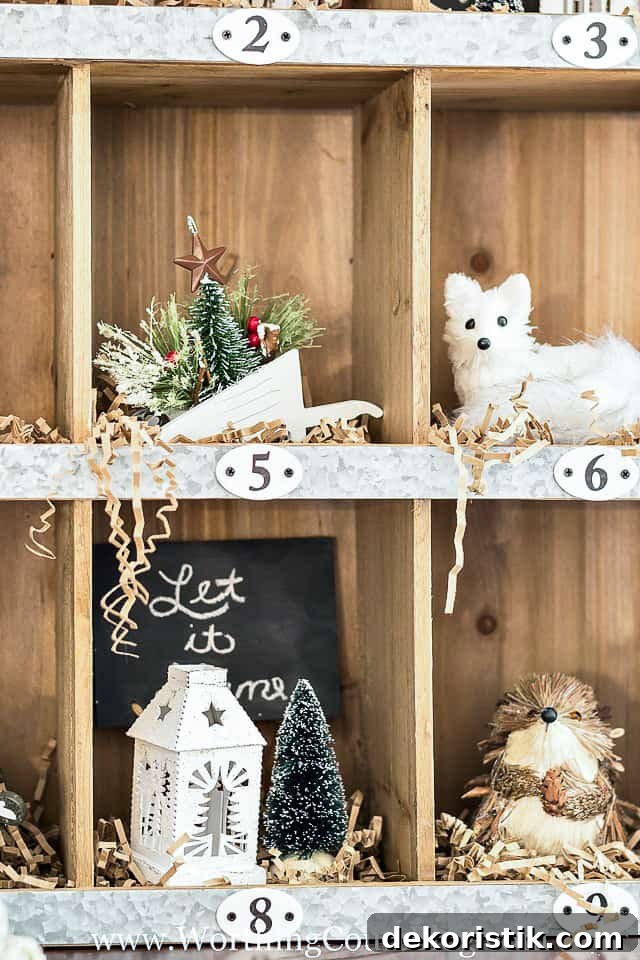 The cubby holes are numbered and in one is a little Christmas tree and berries and in another is a winter fox.
