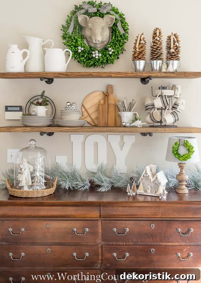 The rustic open shelves and sideboard decorated for Christmas.