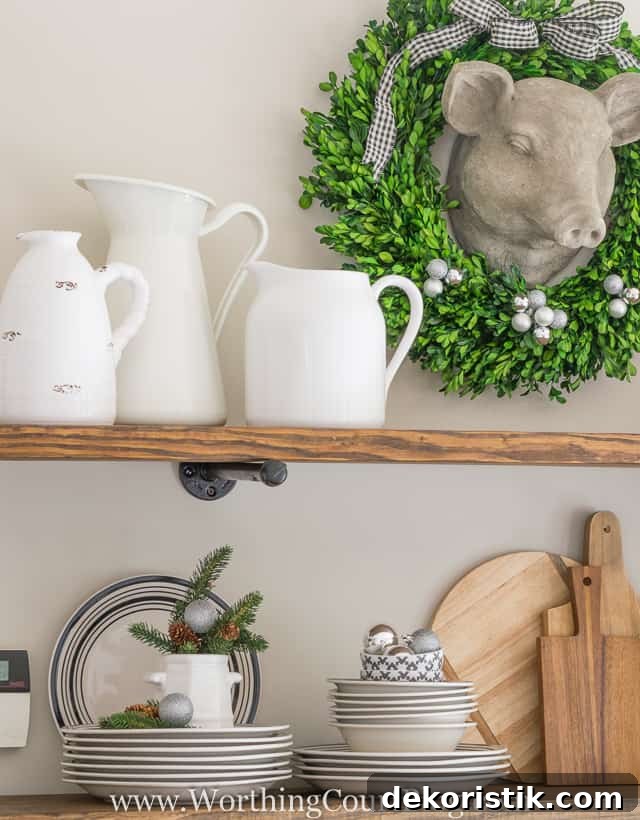 Rustic Farmhouse Kitchen Shelves Decorated For Christmas with a pigs ceramic head and a wreath around it.