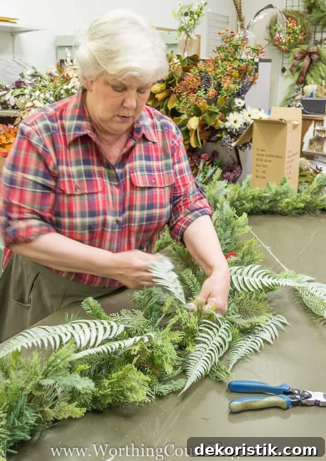 Fluffing the greens and arranging it on a table.