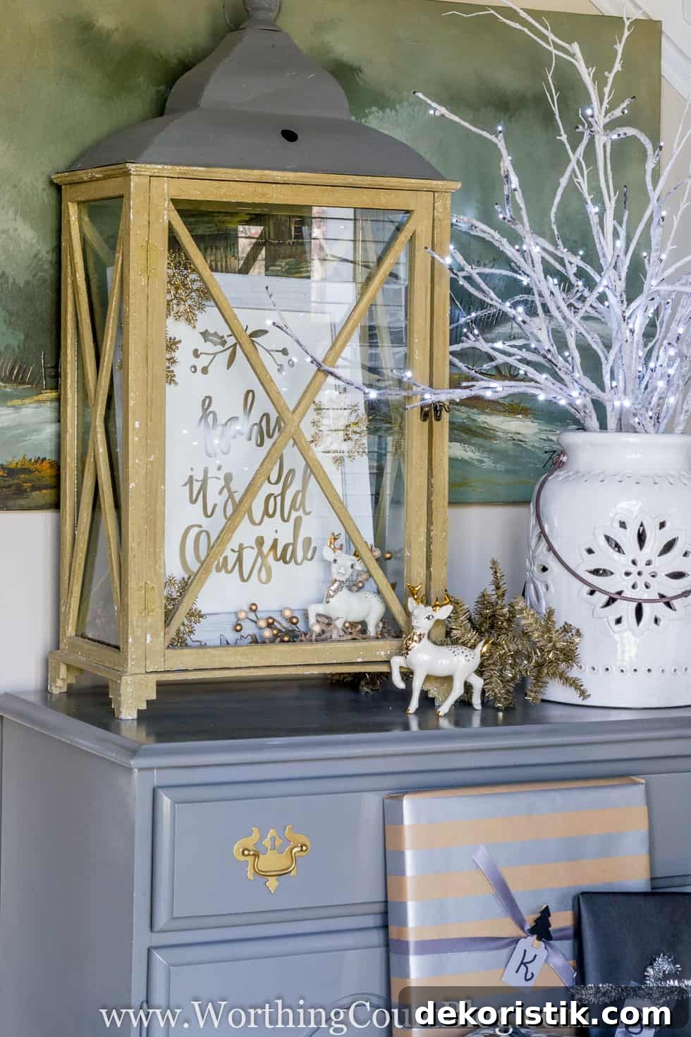 A rustic lantern with the print inside it.