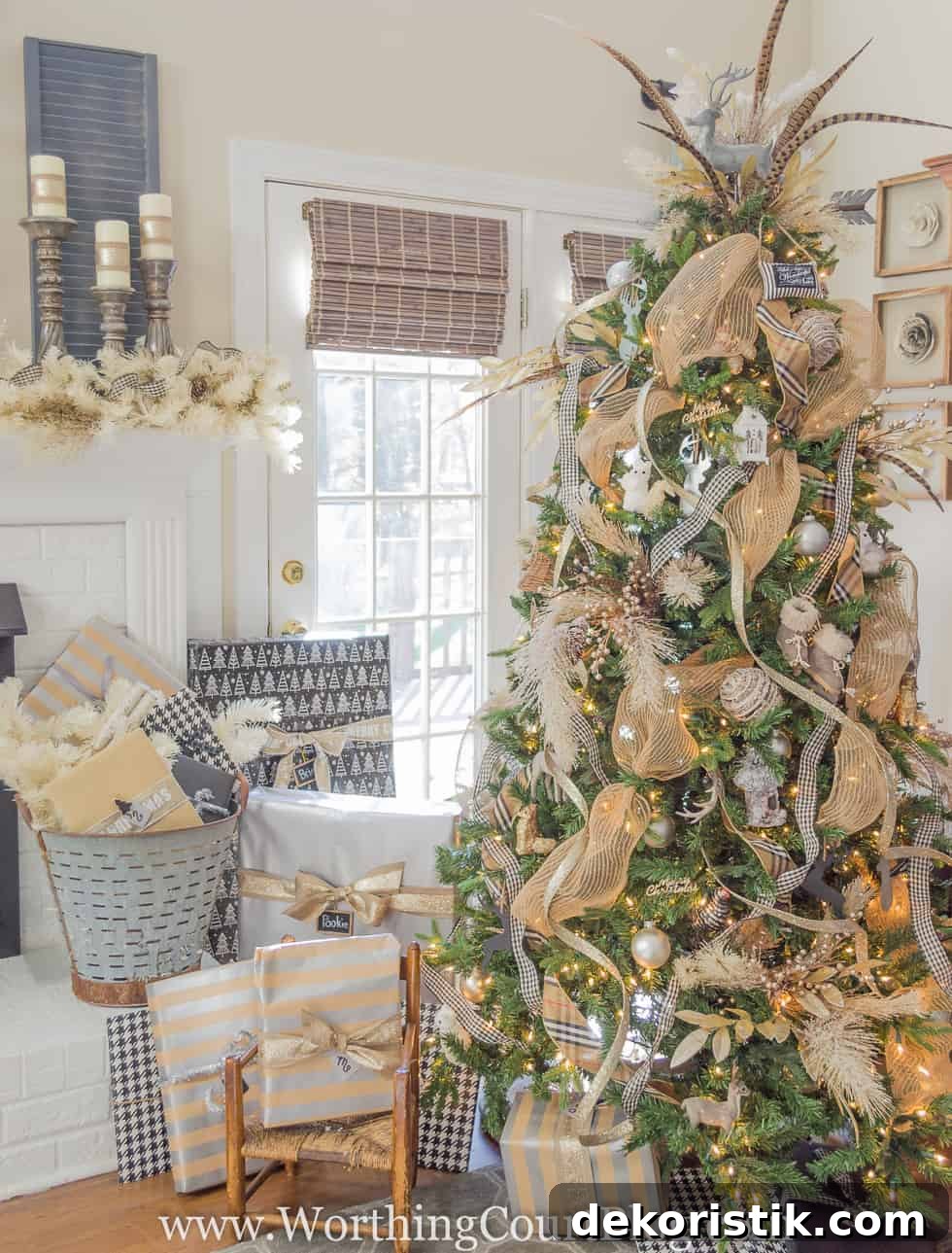 Finally: Christmas Tree and Mantel Decor Reveal 4 A large Christmas tree decorated with gold ribbon and feathers.