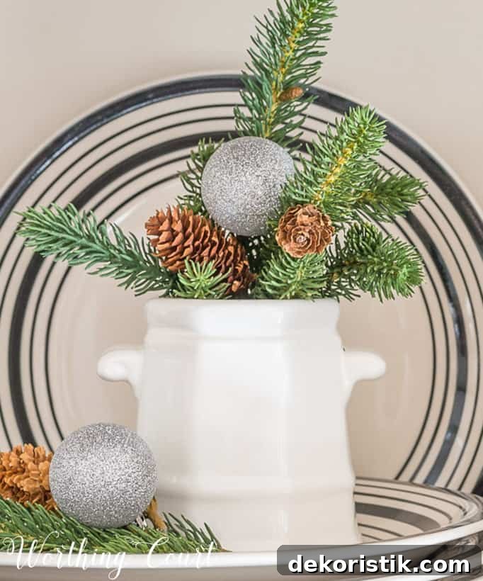 6 Smart Steps Now to Simplify Next Christmas 2 small white stoneware container with winter greens