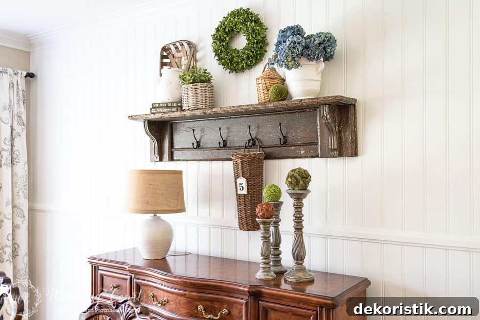 A wooden shelf on the planked wall.