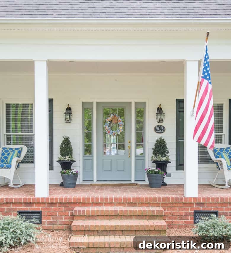 A front porch with farmhouse style and simple to do planters