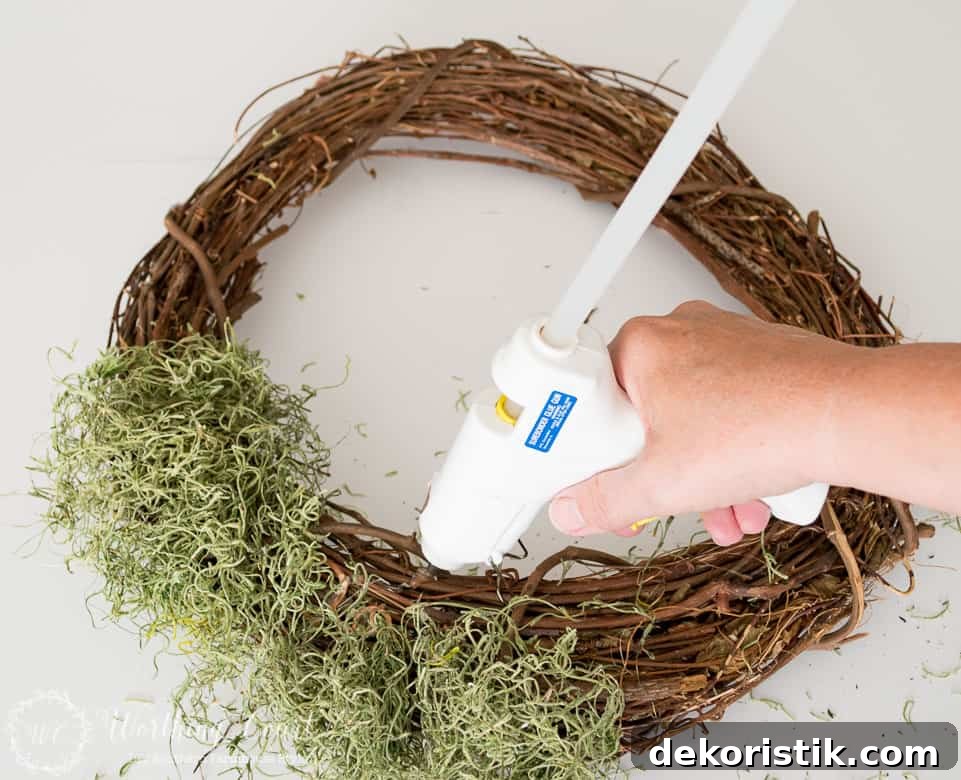 attaching spanish moss to a wreath