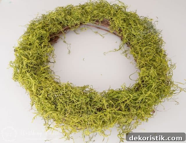 grapevine wreath covered with spanish moss