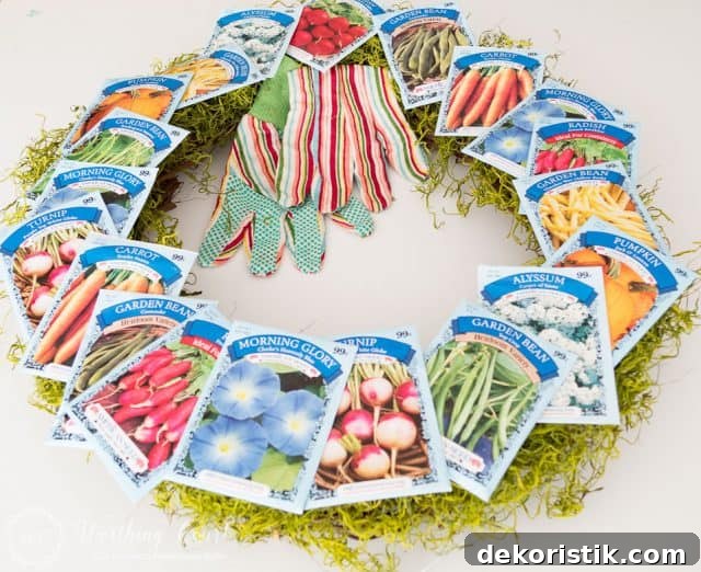 garden theme wreath with seed packets attached