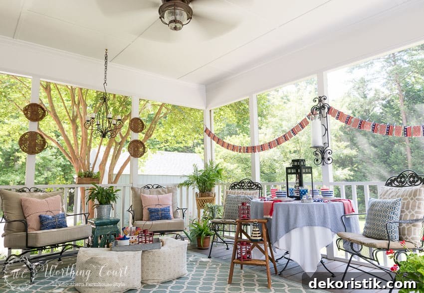 A farmhouse porch filled with loads of red, white and blue vintage Americana patriotic decorating ideas for Memorial Day, Flag Day and July 4th.