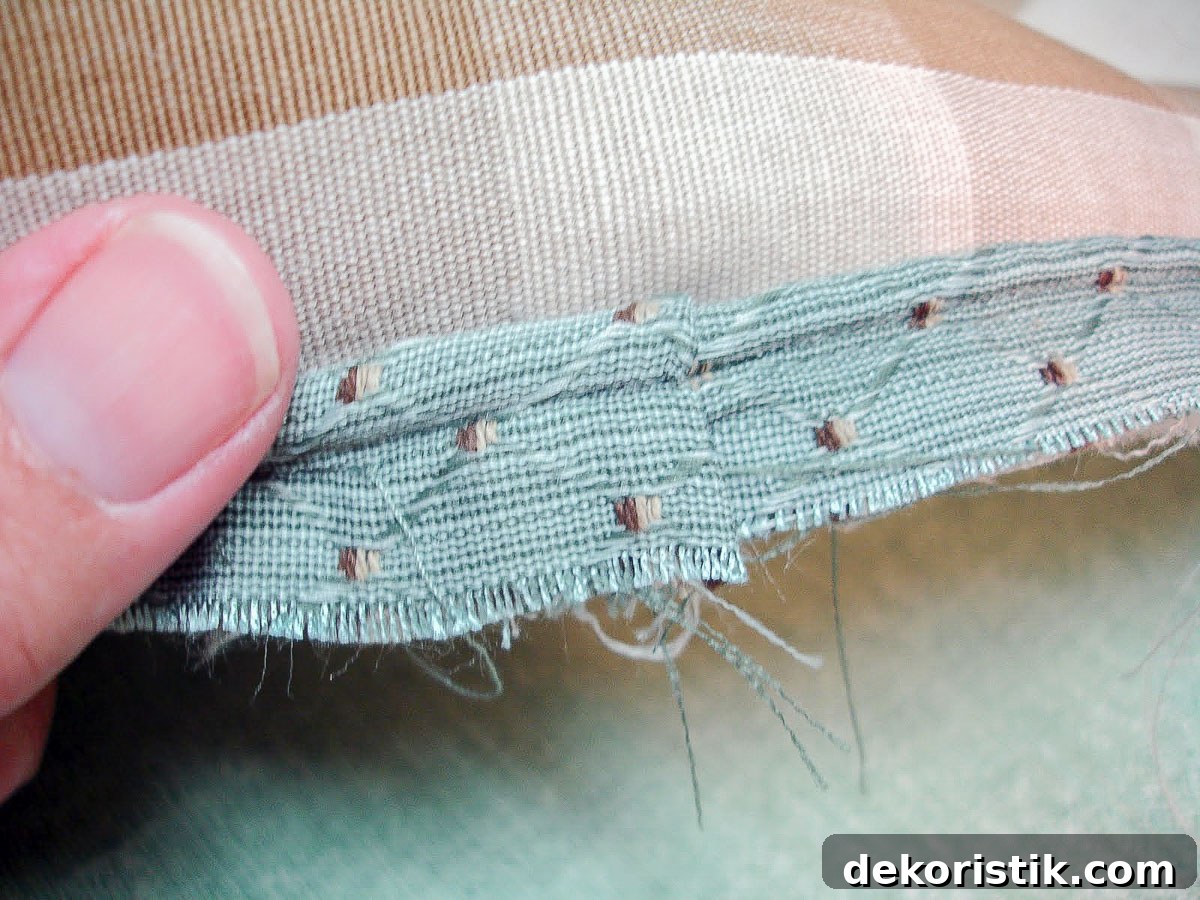 blue covered cording being applied to the right side of the fabric for a pillow sham