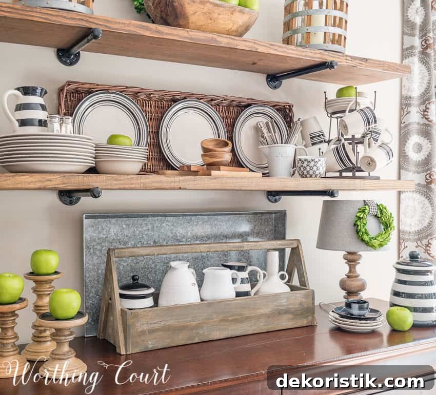 Open rustic farmhouse kitchen shelves decorated for late summer
