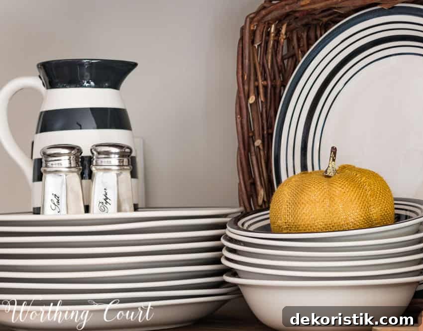 The salt and pepper shakers are on the plates that are on the shelves.