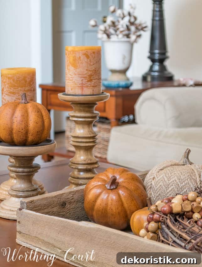 Fall vignette using an old planter's tray and candlesticks on a coffee table || Worthing Court
