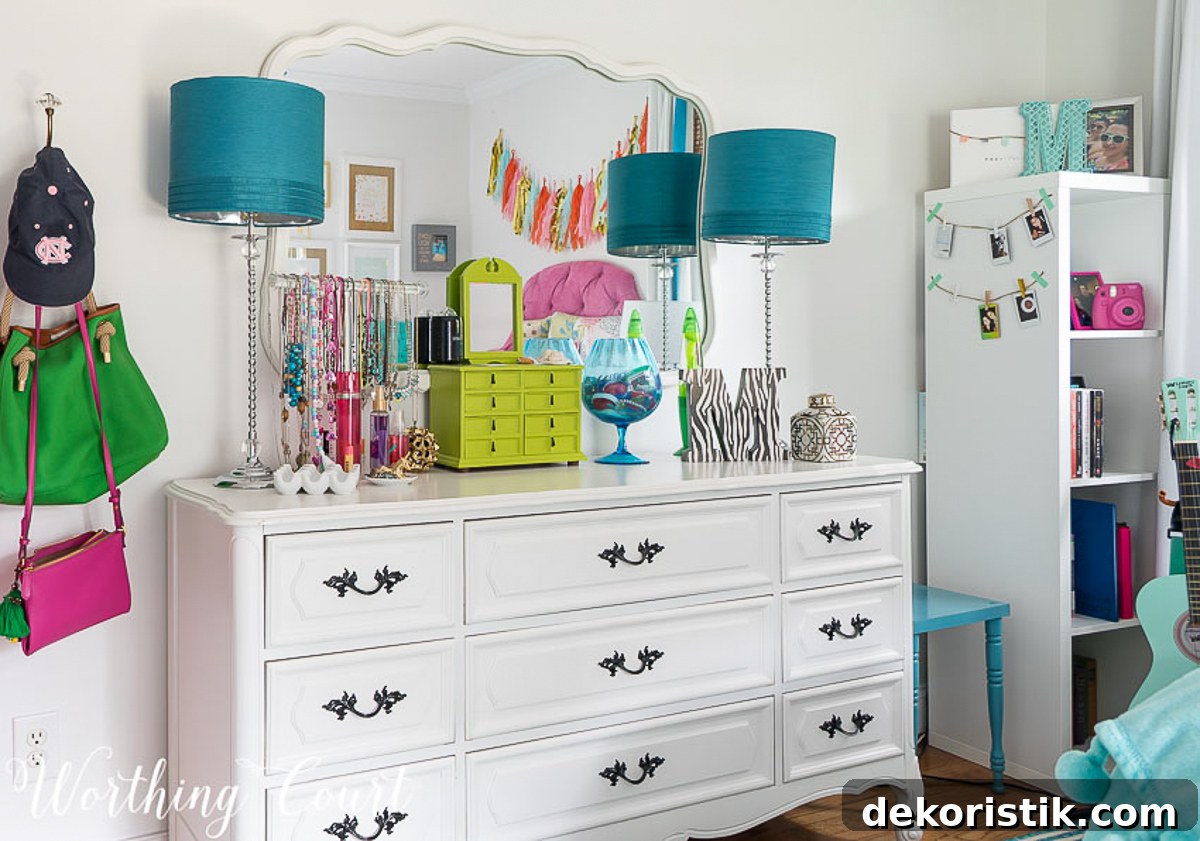 white painted furniture and teal lamps in a colorful teen bedroom