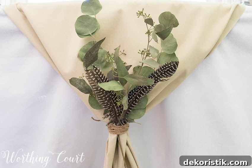 Try gathering a table runner on the ends, tying it with twine and tucking in a few natural elements for your Thanksgiving table || Worthing Court