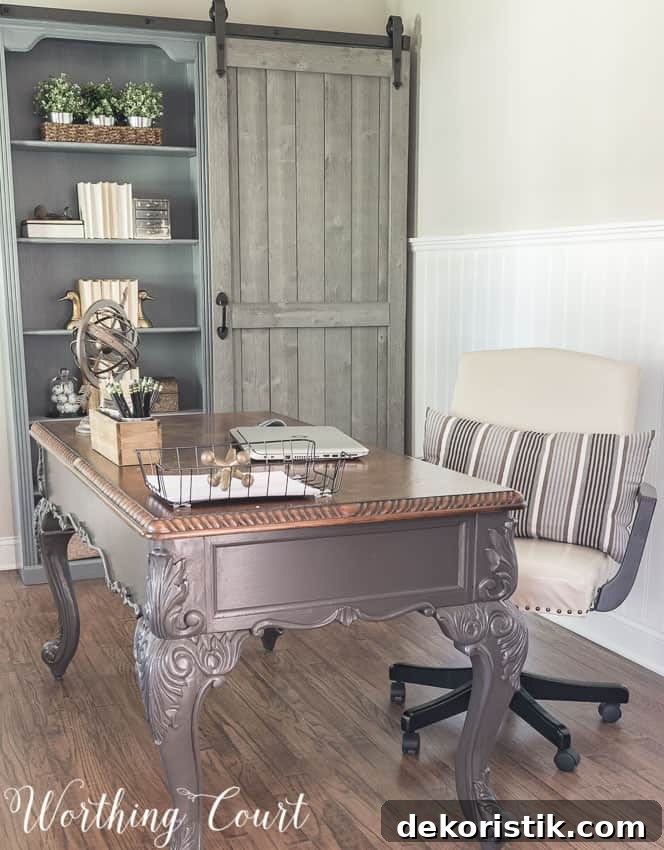 Up close picture of the desk and the barn door bookcase.