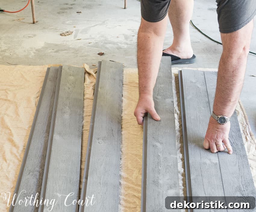 Laying out the wood for a diy barn door.
