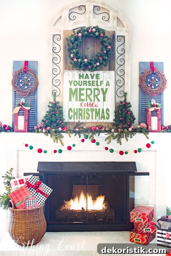 Merry Christmas farmhouse mantel a sign that says Have Yourself A Merry Little Christmas.
