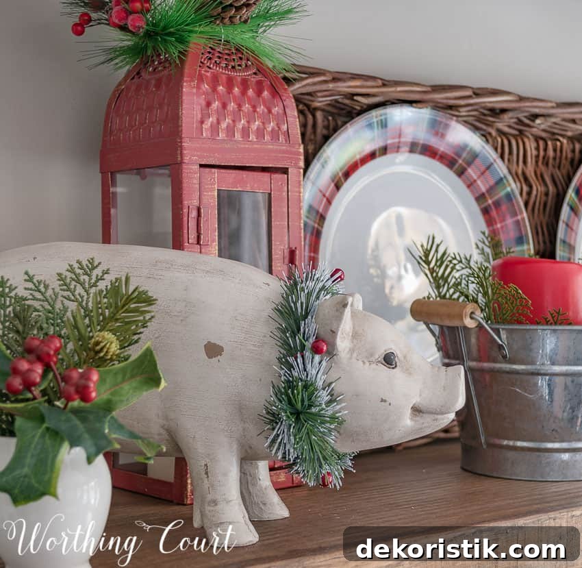 Farmhouse Christmas Breakfast Nook Decor Ideas 6 A ceramic pig with a wreath around its neck is on the open shelving unit.