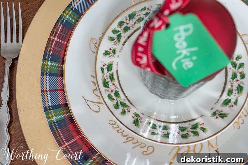 Mixed dinnerware Christmas place setting aerial view.