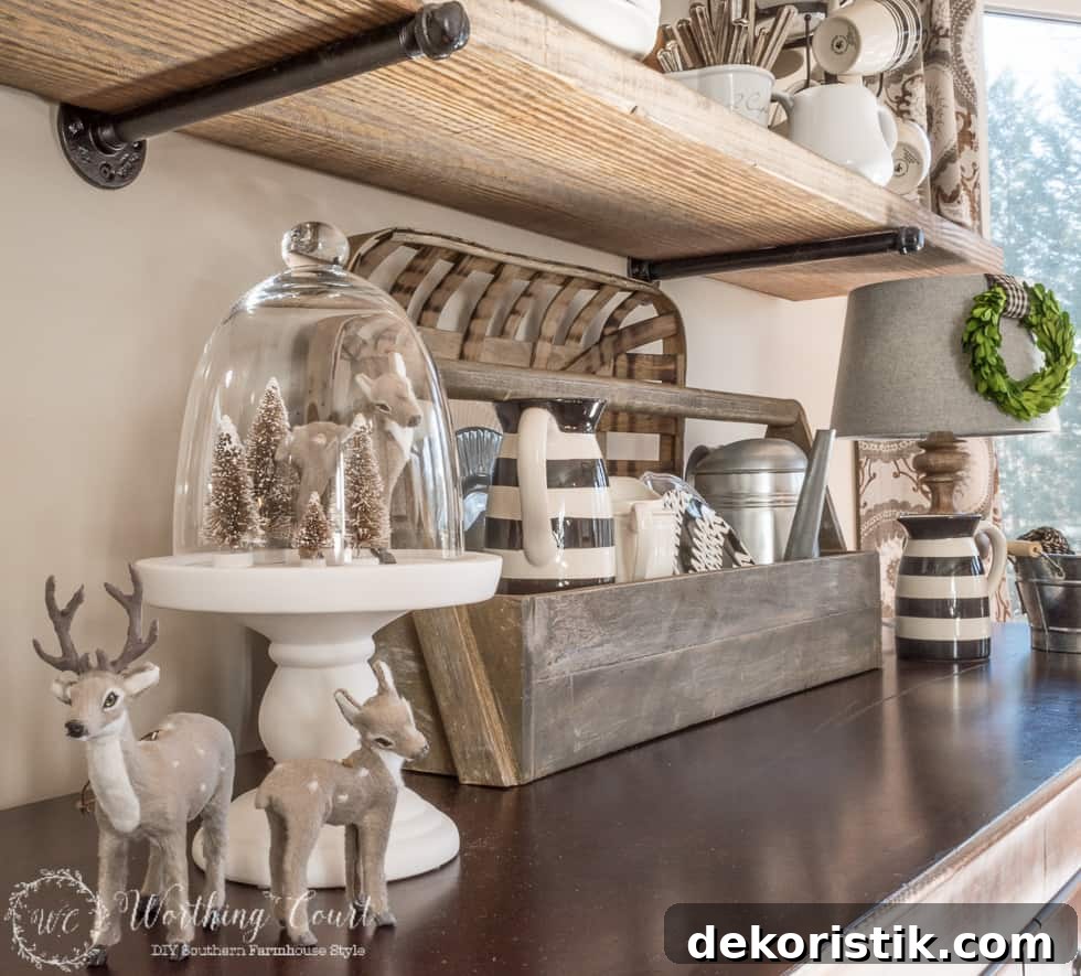 A little winter vignette using deer Christmas ornaments and neutral colored bottle brush trees