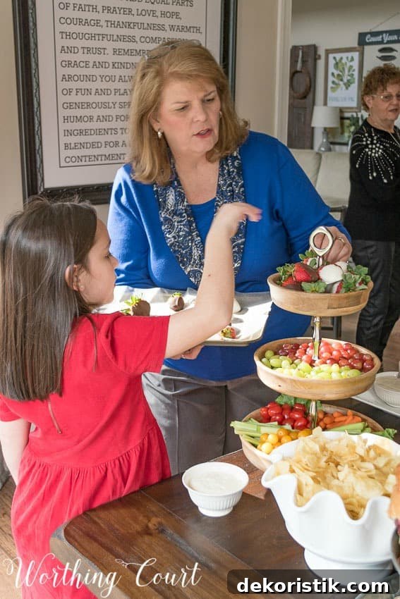 Unforgettable Weekend at Worthing Court 7 Suzy and granddaughter taking fresh fruit and vegetables from the table.