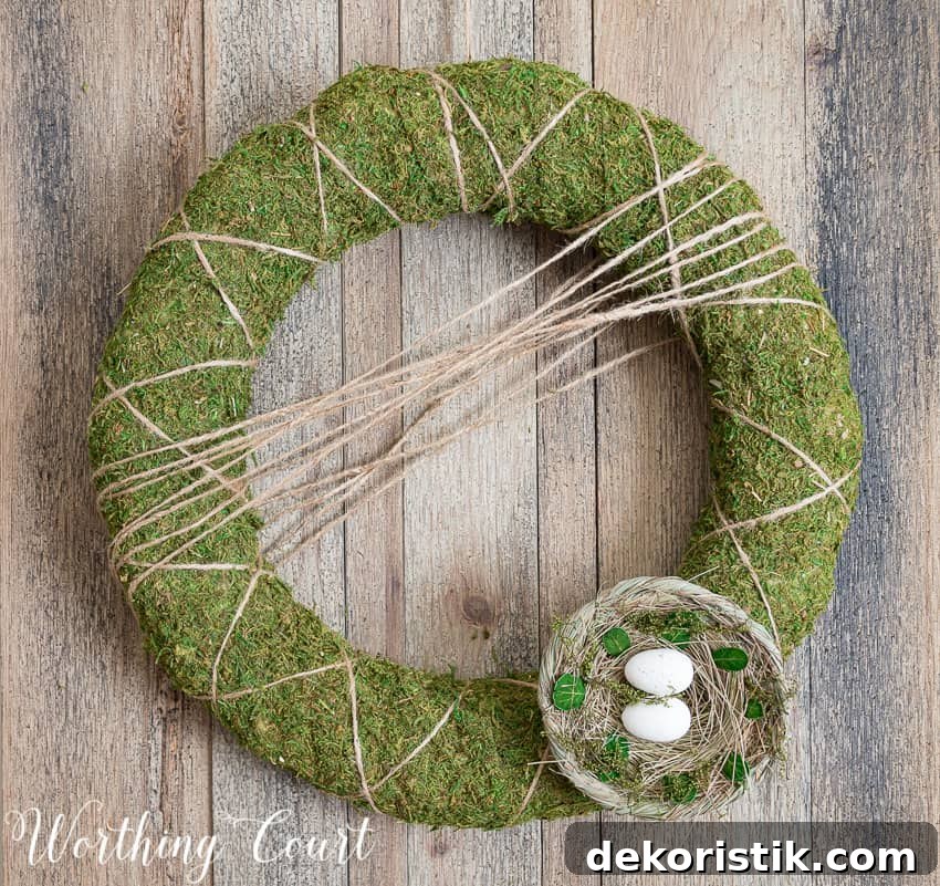 The little birds nest at the bottom of the wreath.
