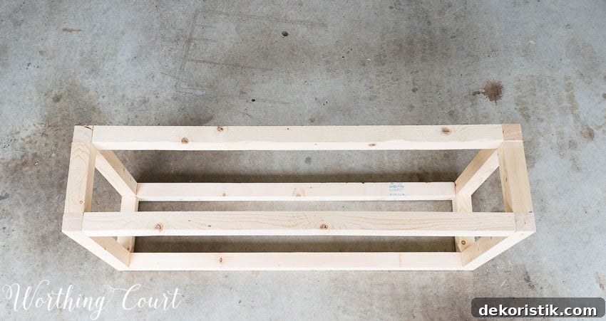 Putting together the wooden base for the bench.