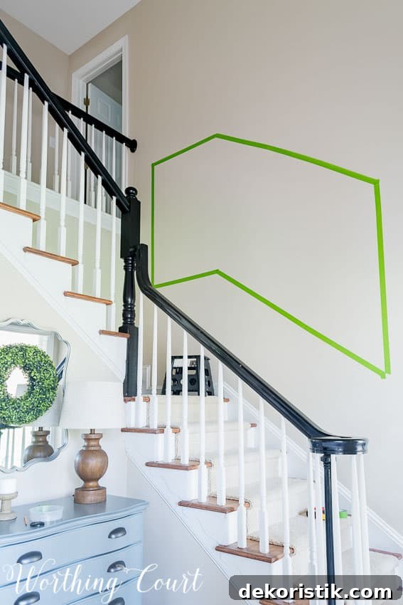 Gallery Wall Ideas for Staircases 3 Use painter's tape to help determine the size and layout of a stairway gallery wall.