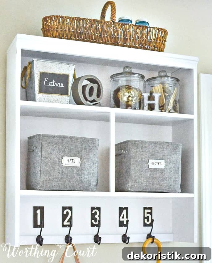 The top half of an old hutch makes a great piece for turning into a dropzone when you don't have any place available for a mudroom || Worthing Court