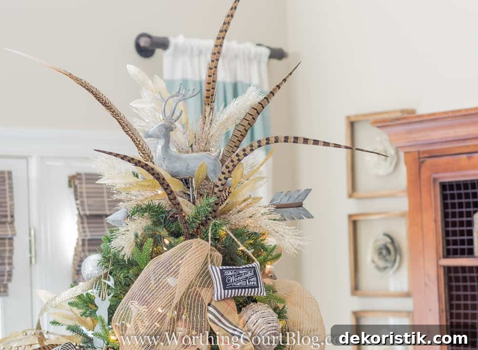 Rustic Meets Glam: Stylish Christmas Decor Ideas 7 Christmas tree topper using a galvanized deer and arrow weathervane, feathers and stems from a variety of sprays.