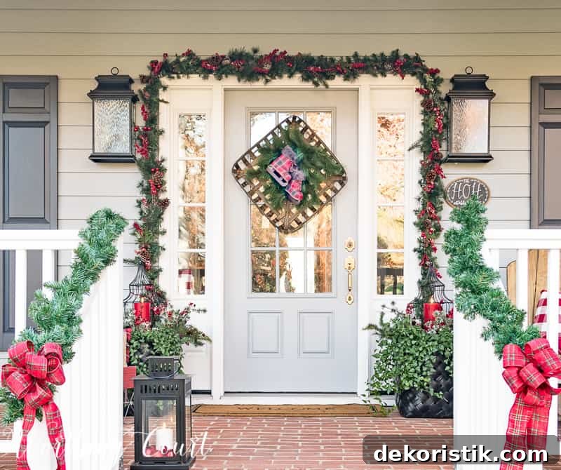 Festive Christmas front porch decorated with red and green.