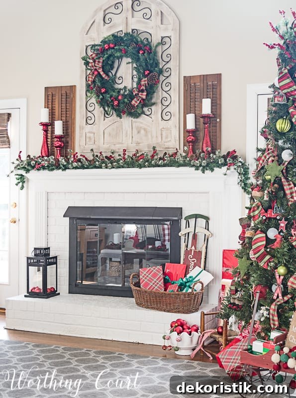 Fireplace and mantel with Christmas decor #christmasdecor #christmasmantel