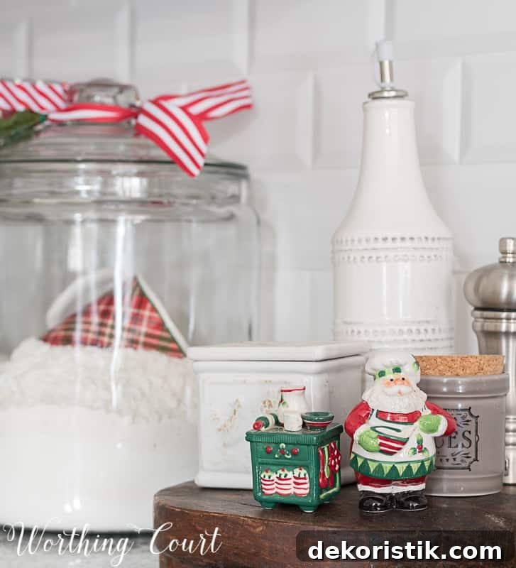 Simple Christmas kitchen touches such as red and white bows.