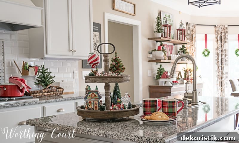 Two tiered wood tray filled with Christmas decorations on the kitchen island.