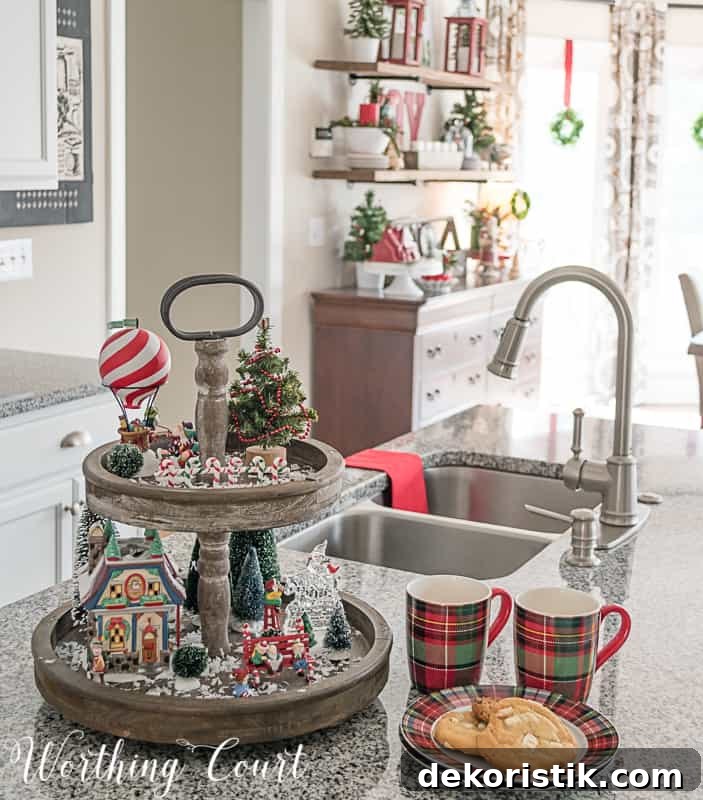 There are two coffee cups on the counter and a plate filled with cookies.