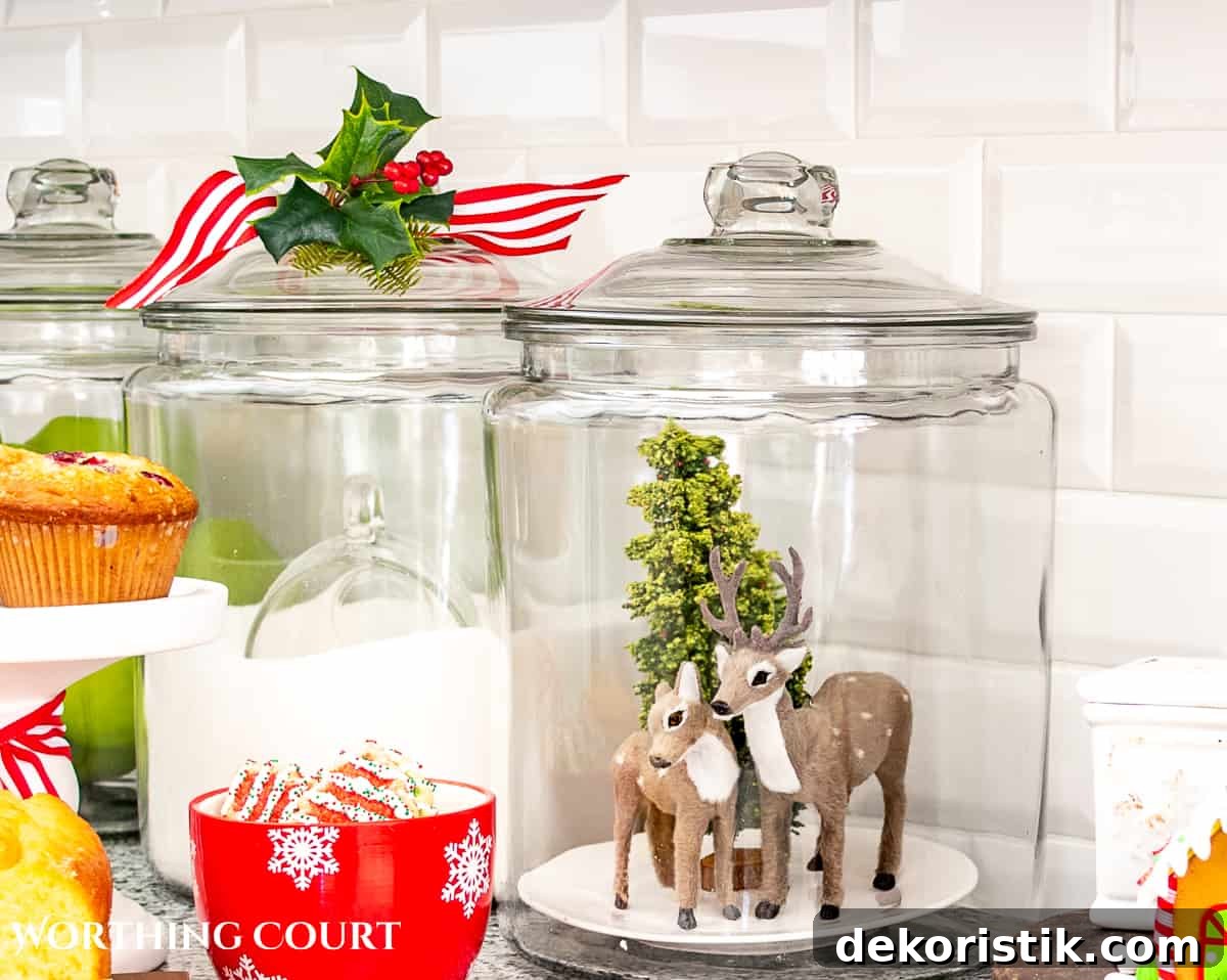 clear glass cannister filled with deer Christmas ornaments and a bottle brush tree for Christmas