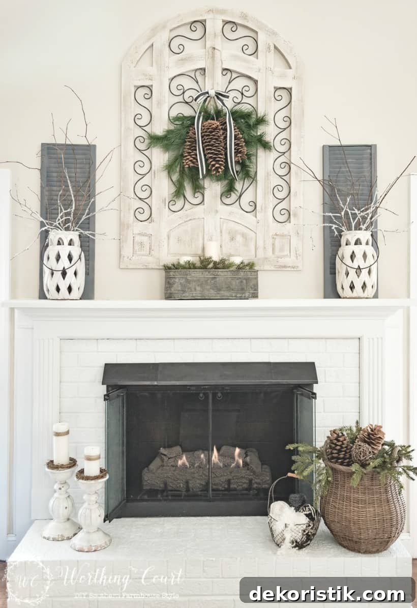 Fireplace decorated for winter with a wicker basket in front of the fireplace.