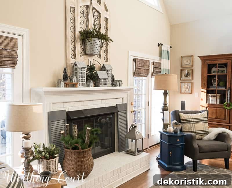 Farmhouse winter decorations, winter fireplace decor in a neutral living room.