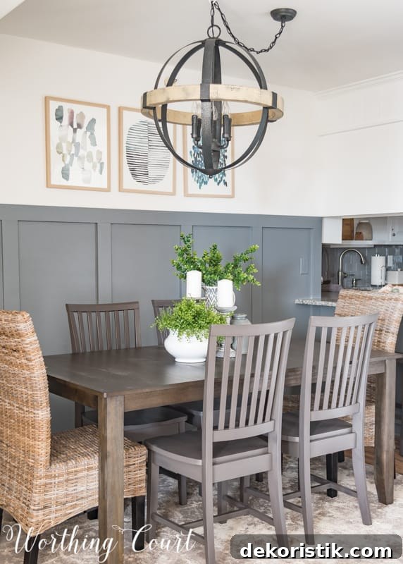 Modern farmhouse dining room, gray board and batten wall, orb chandelier, rustic industrial, abstract art