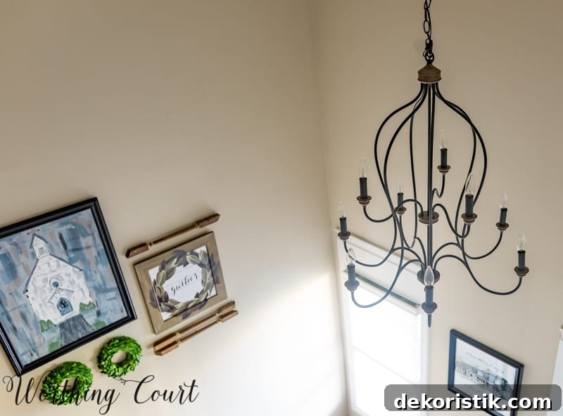 Entryway Makeover Reveal: DIY Ideas Using What You Have 12 Two story foyer chandelier.