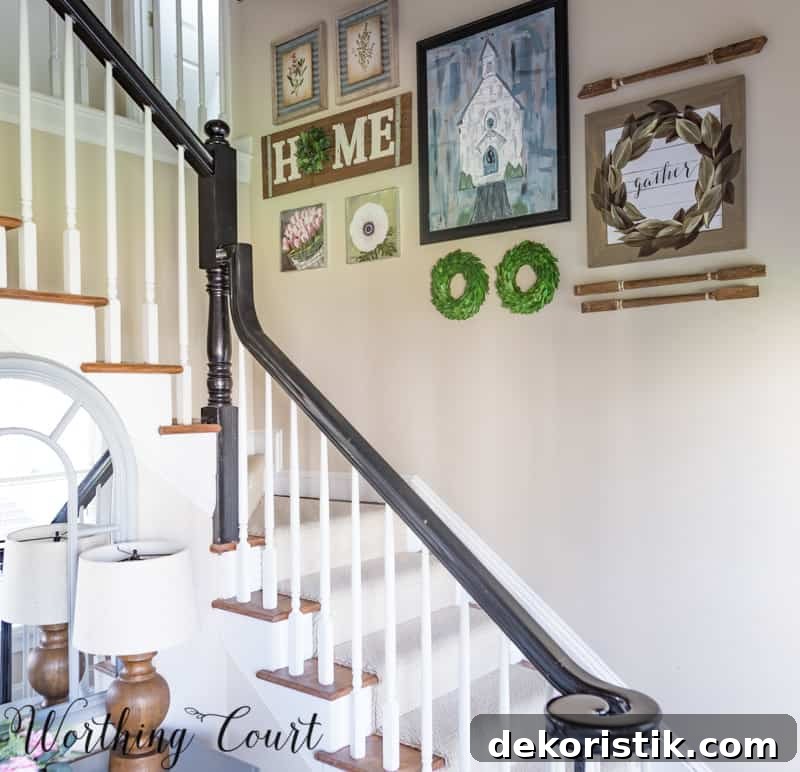 Entryway Makeover Reveal: DIY Ideas Using What You Have 14 A black bannister.